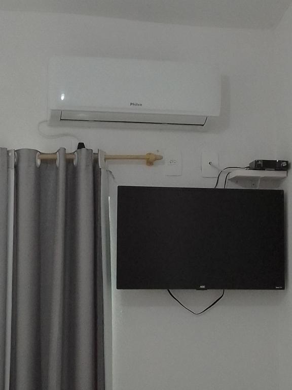 TV a/nebo společenská místnost v ubytování Pousada Pé na Areia