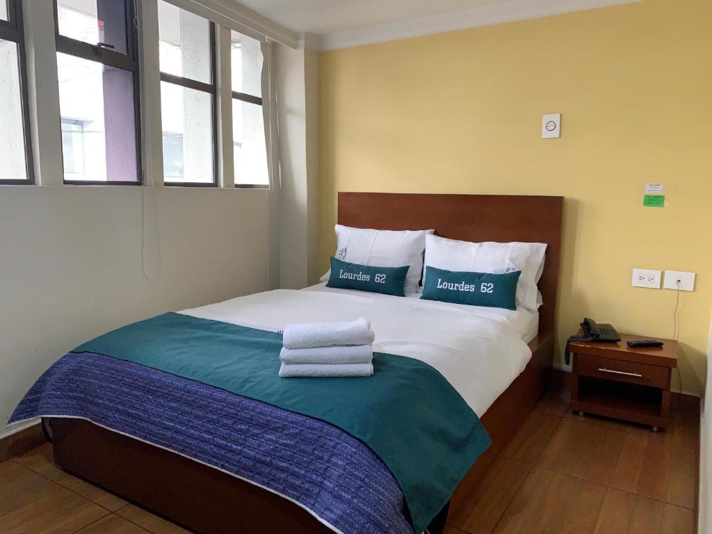 Postel nebo postele na pokoji v ubytování Hotel Lourdes la 62