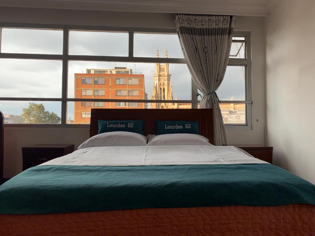 Postel nebo postele na pokoji v ubytování Hotel Lourdes la 62