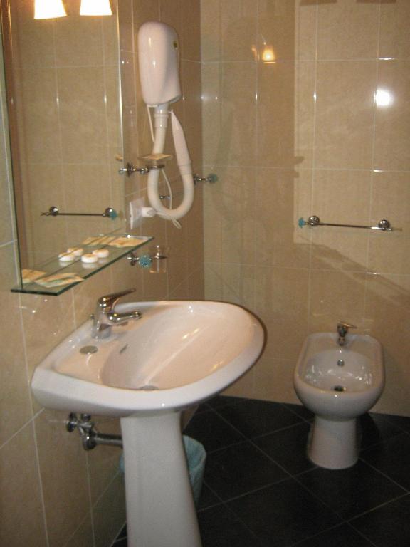 Koupelna v ubytování Hotel Ferraro