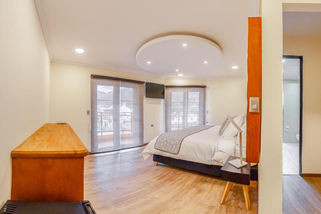 Postel nebo postele na pokoji v ubytování Orígenes Arcabuco Hotel Boutique