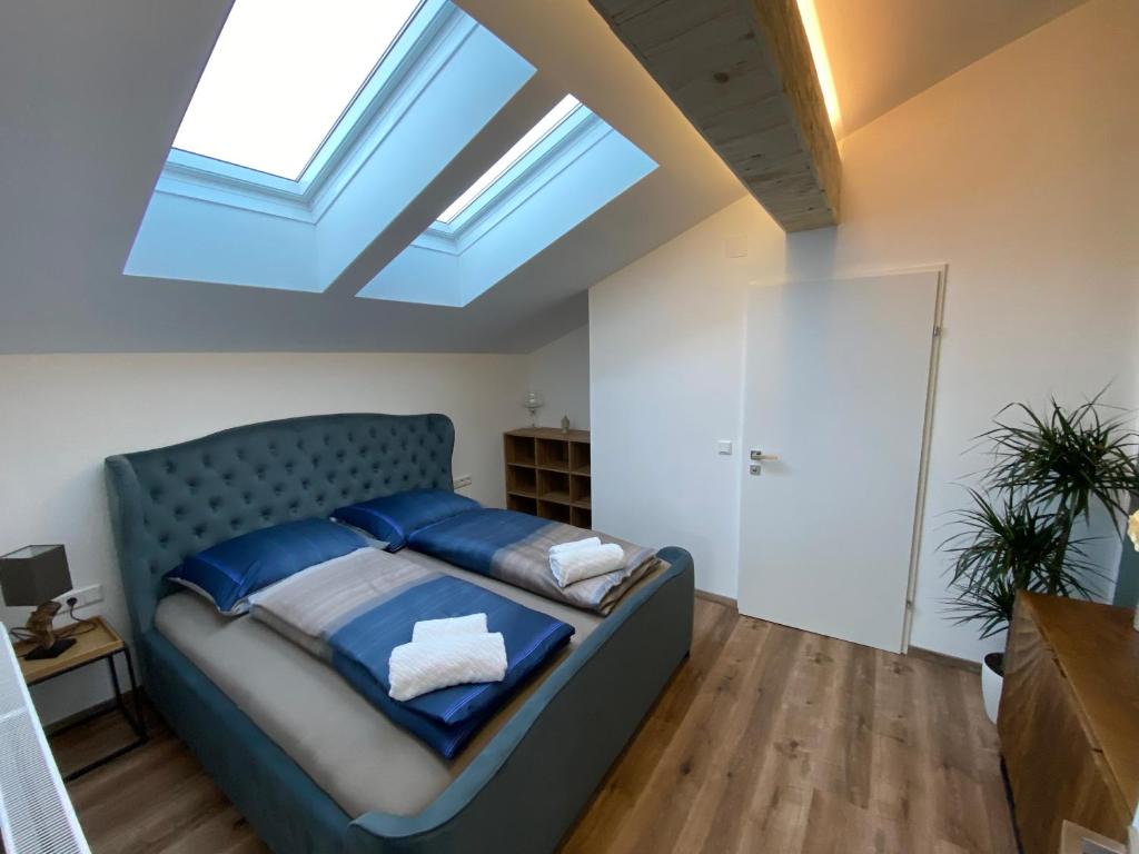 Postel nebo postele na pokoji v ubytování Living8-Appartements