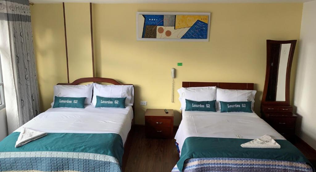 Postel nebo postele na pokoji v ubytování Hotel Lourdes la 62