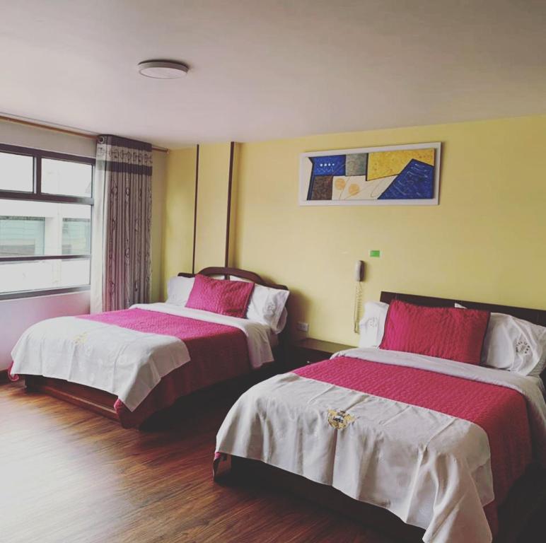 Postel nebo postele na pokoji v ubytování Hotel Lourdes la 62