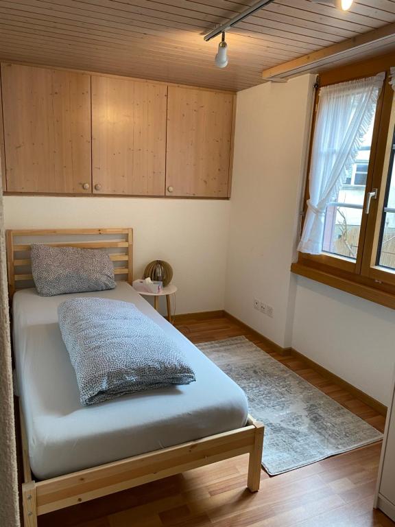 Postel nebo postele na pokoji v ubytování Haus Wiggis