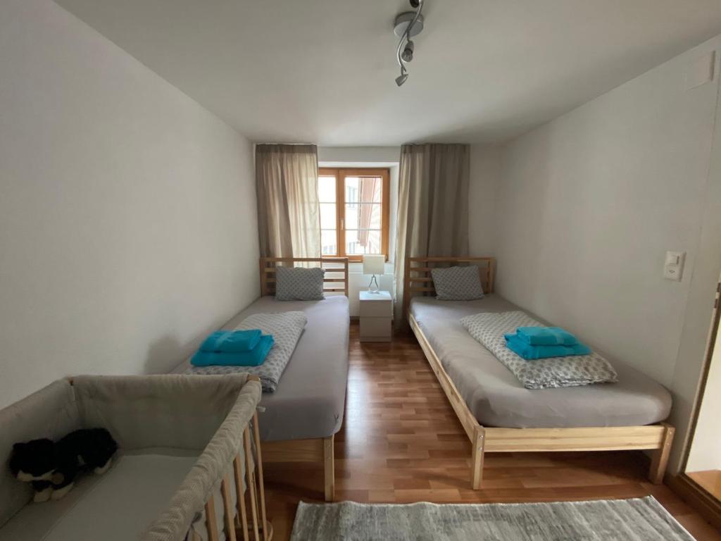 Postel nebo postele na pokoji v ubytování Haus Wiggis