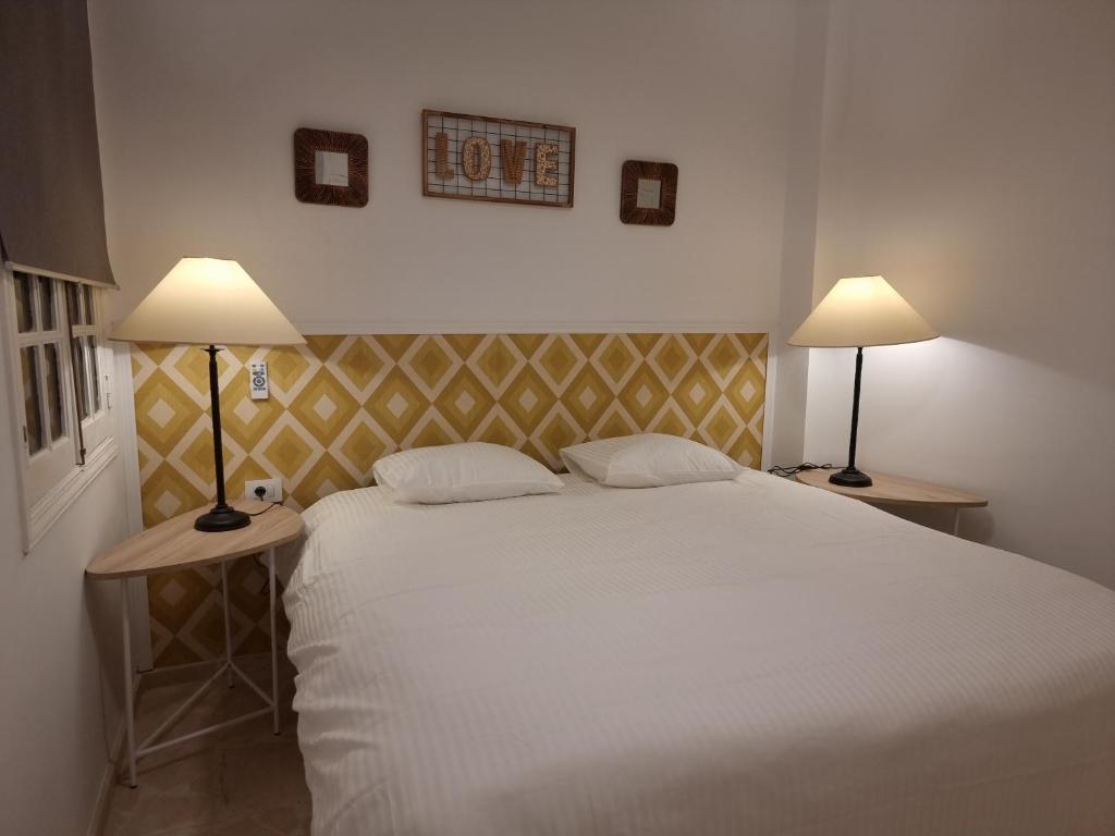 A bed or beds in a room at Los Gigantes apartamento de 3 habitaciones
