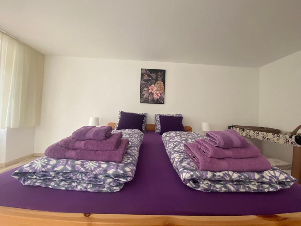 Postel nebo postele na pokoji v ubytování Haus Wiggis