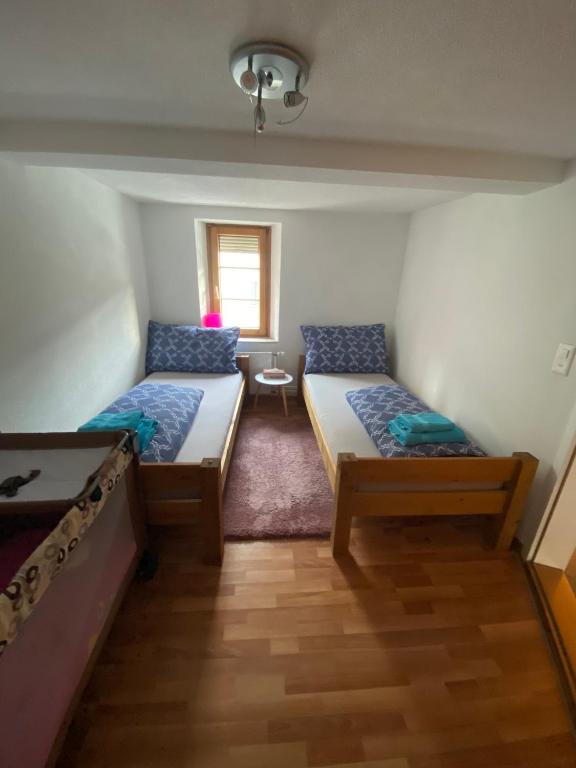 Postel nebo postele na pokoji v ubytování Haus Wiggis