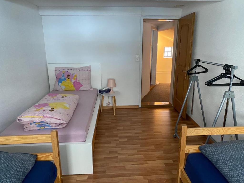 Postel nebo postele na pokoji v ubytování Haus Wiggis