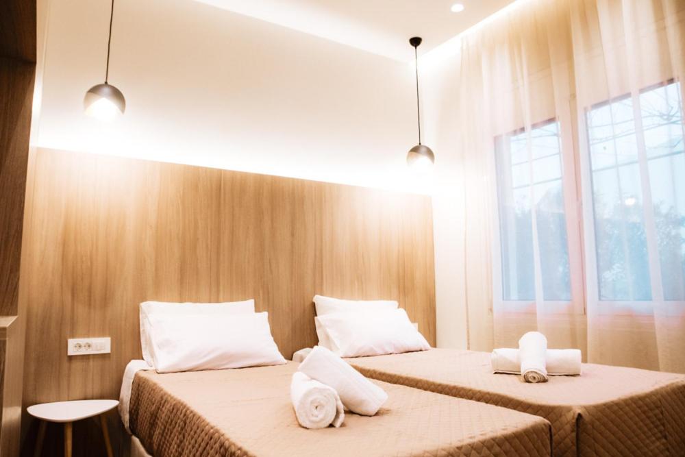 Posteľ alebo postele v izbe v ubytovaní Syvota Apartments Family