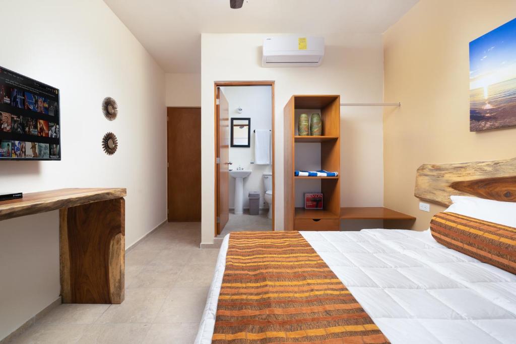 Cama ou camas em um quarto em Villa Sofia Hotel Boutique Cancun