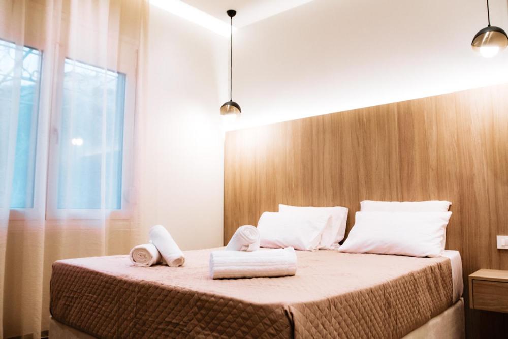Posteľ alebo postele v izbe v ubytovaní Syvota Apartments Family