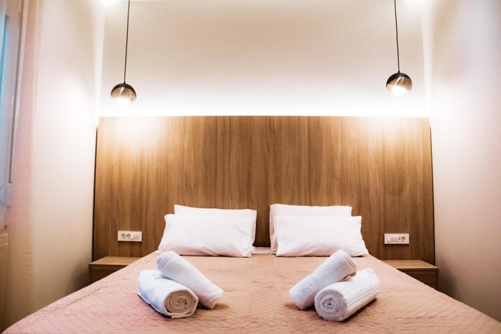 Posteľ alebo postele v izbe v ubytovaní Syvota Apartments Family