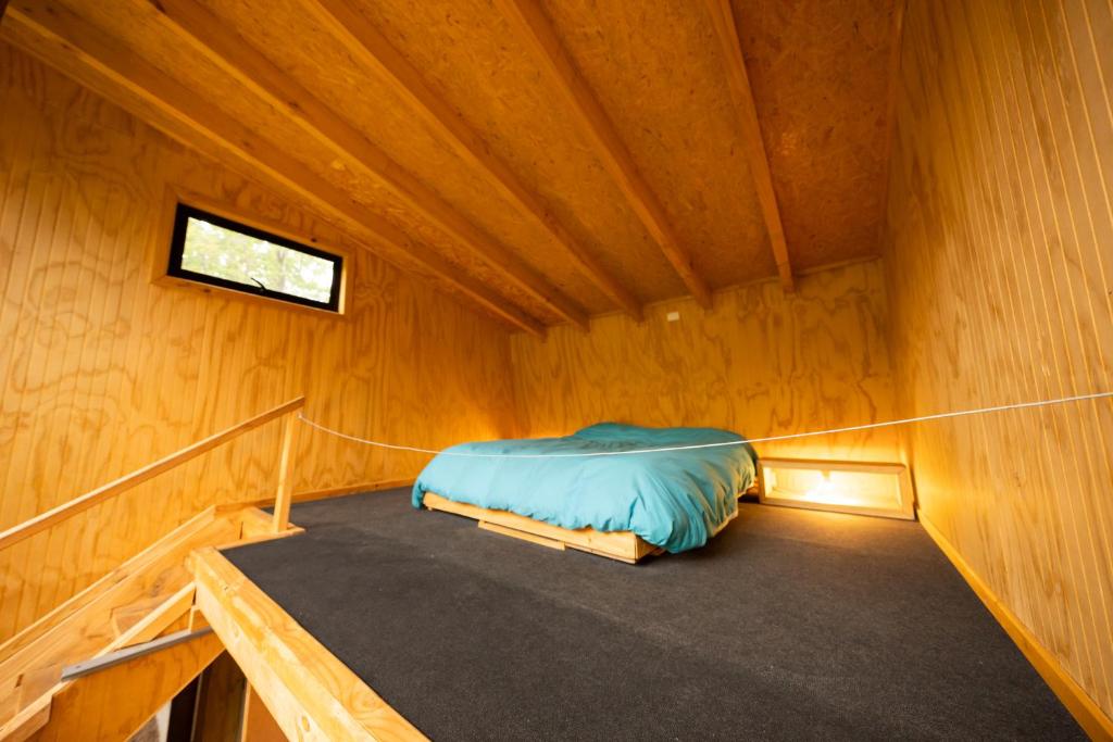 Cama o camas de una habitación en Andrómeda Lodge