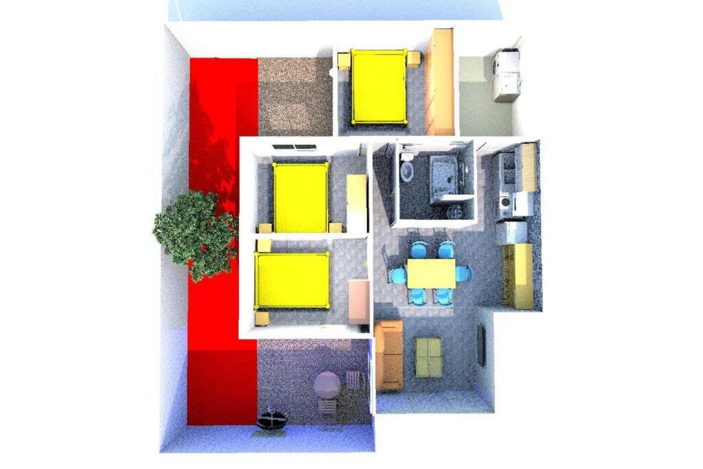 uma planta de uma casa com amarelo e vermelho em Bogotá hermoso departamento en CDMX em Cidade do México