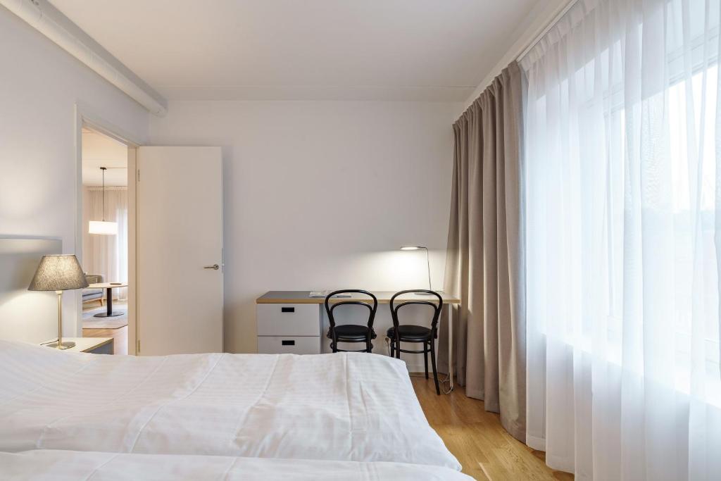 Postel nebo postele na pokoji v ubytování Boo Boo Living