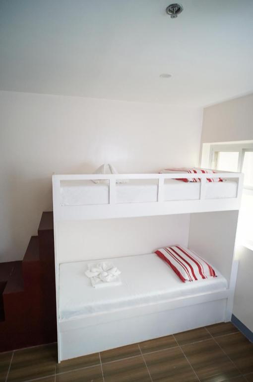 Postel nebo postele na pokoji v ubytování FB DORMITEL SUITES