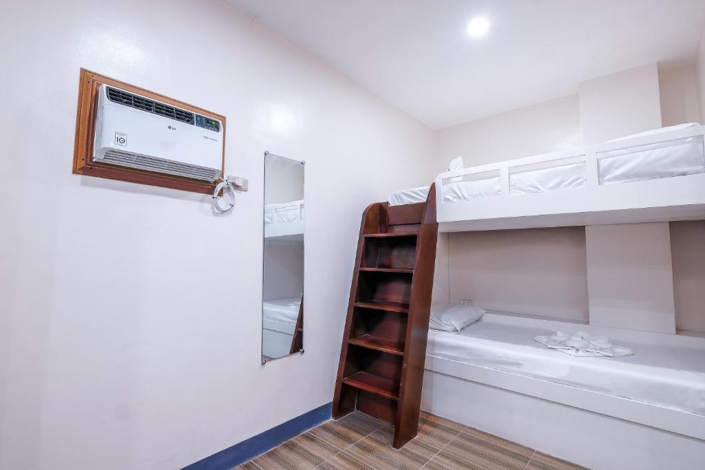 Postel nebo postele na pokoji v ubytování FB DORMITEL SUITES