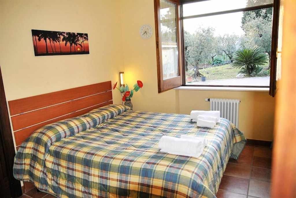 Łóżko lub łóżka w pokoju w obiekcie Uva & Stelle Maison in collina di Sperlonga