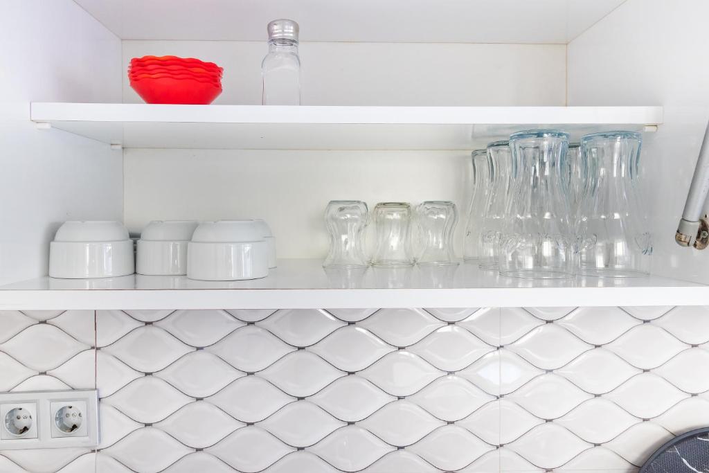 A kitchen or kitchenette at Apartments Near to City Center and Beach