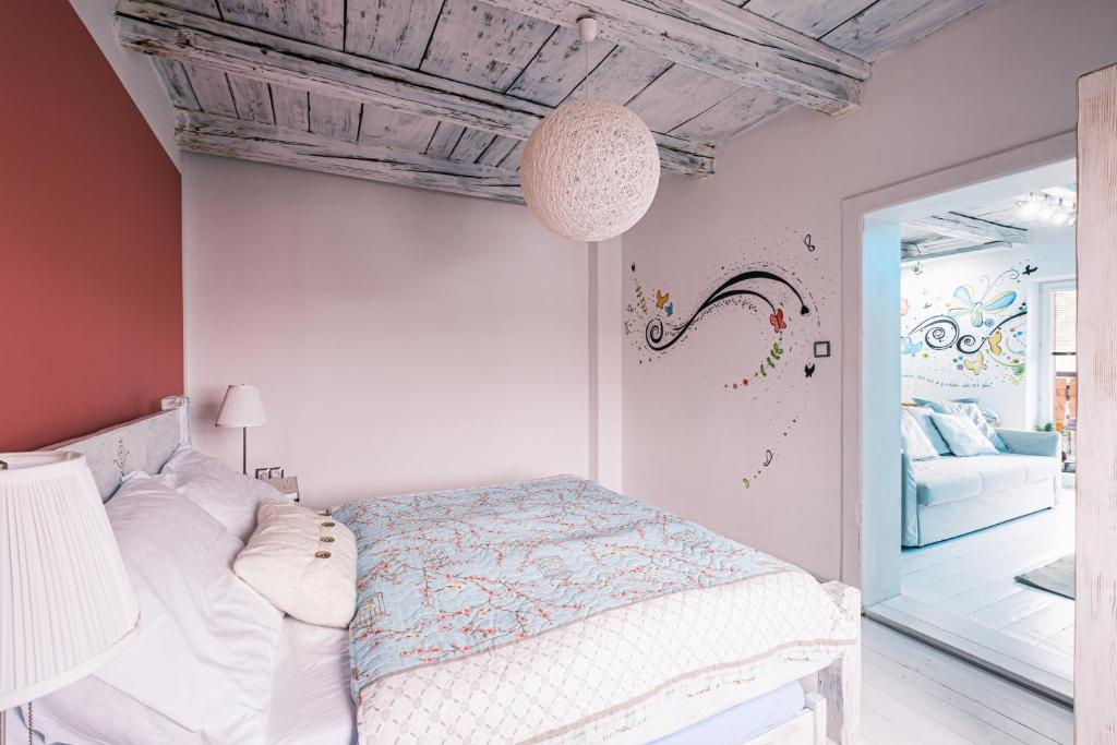 Postel nebo postele na pokoji v ubytování Apartmán Malý princ
