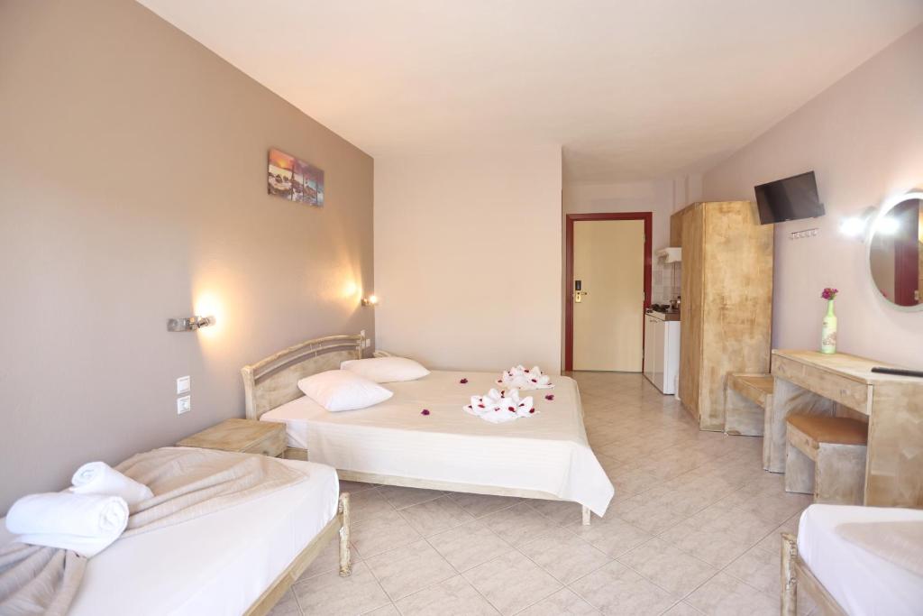Postel nebo postele na pokoji v ubytování Summer Dream Hotel