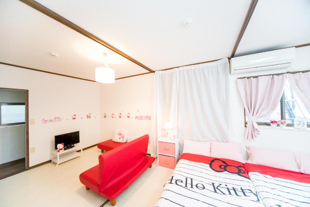 Letto o letti in una camera di Miraie Yokkaichi Kitahamacho