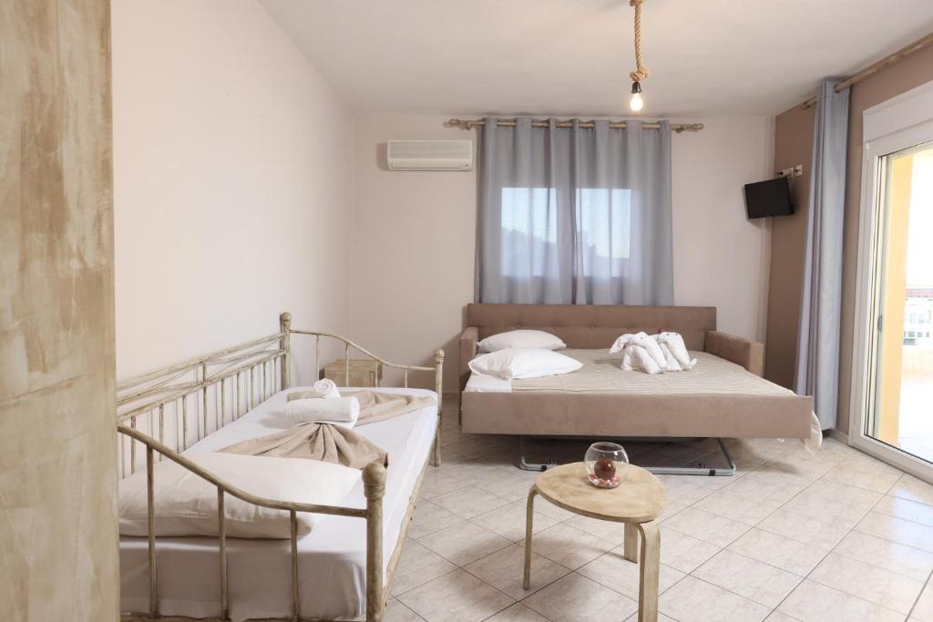 Postel nebo postele na pokoji v ubytování Summer Dream Hotel