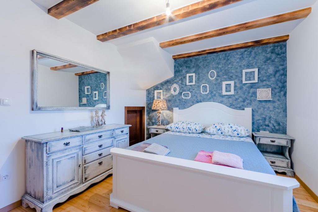 Posteľ alebo postele v izbe v ubytovaní Holiday Home Rustic