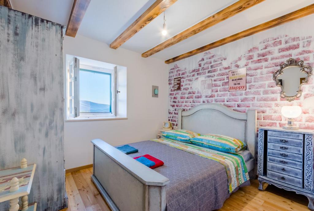 Posteľ alebo postele v izbe v ubytovaní Holiday Home Rustic