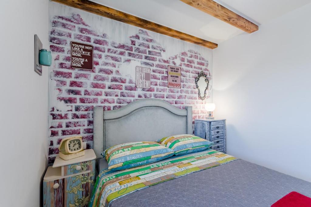 Posteľ alebo postele v izbe v ubytovaní Holiday Home Rustic