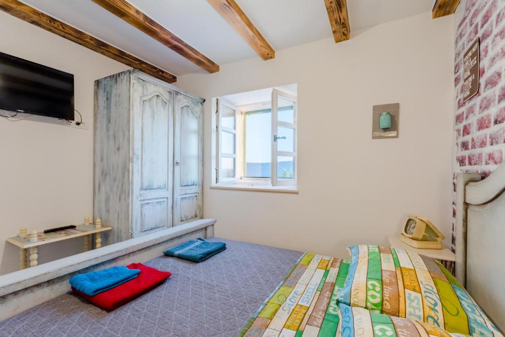 Posteľ alebo postele v izbe v ubytovaní Holiday Home Rustic
