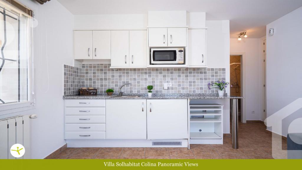 Kuchyň nebo kuchyňský kout v ubytování Solhabitat Colina Panoramic Views