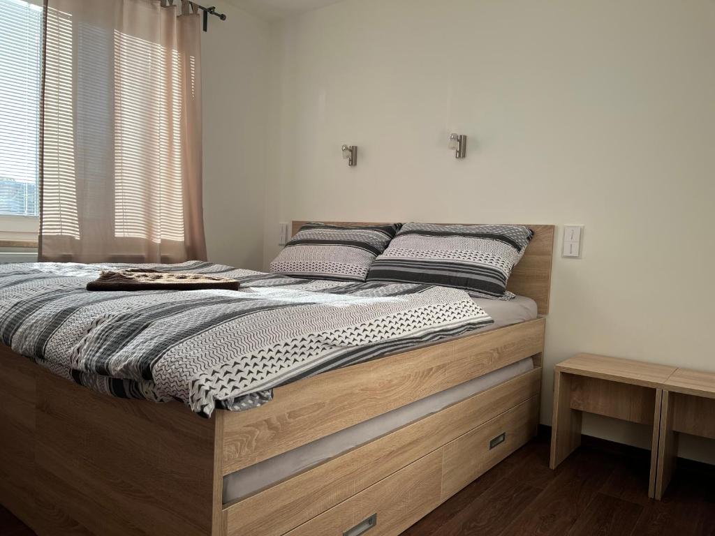 Postel nebo postele na pokoji v ubytování Penzion Na Rozcestí