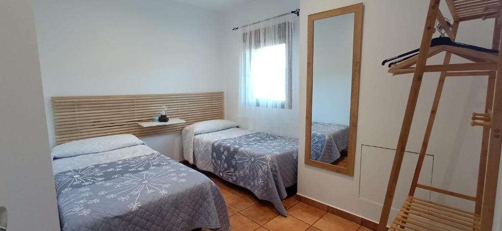 Postel nebo postele na pokoji v ubytování Casa Rural Miralmonte