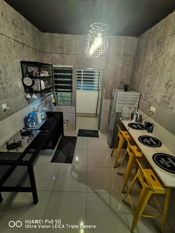 Kuchyň nebo kuchyňský kout v ubytování Adelea Homestay MERU