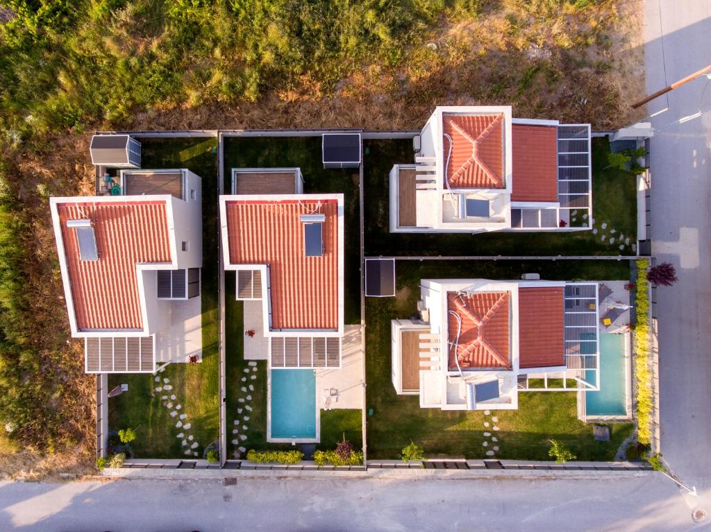 an overhead view of a house with a yard at AG Luxury Villas, Iraklitsa in Iraklitsa