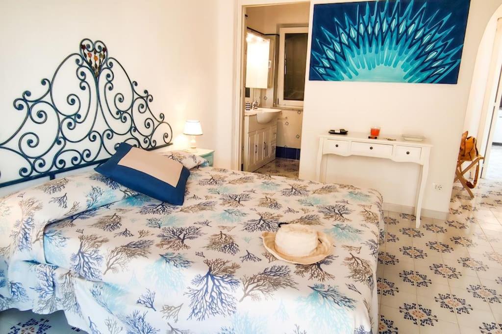 Postel nebo postele na pokoji v ubytování Villa Conchiglia blu con piscina