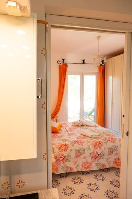 Postel nebo postele na pokoji v ubytování Villa Conchiglia blu con piscina