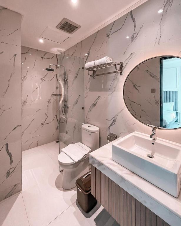 Koupelna v ubytování Kala Hotel Semarang