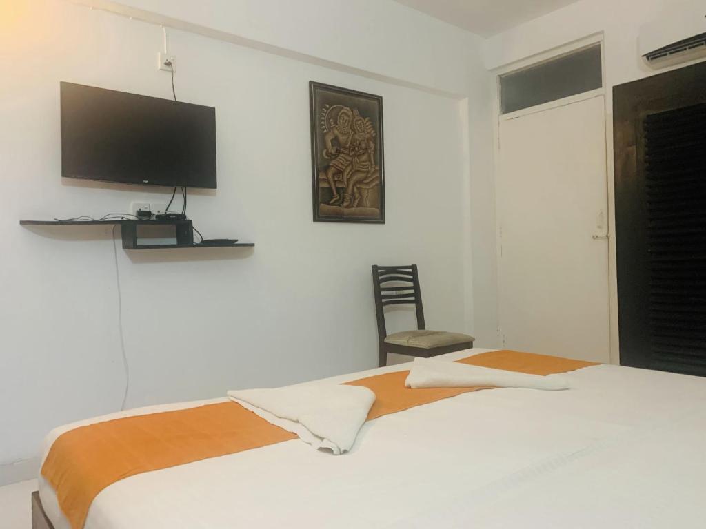 Postel nebo postele na pokoji v ubytování 360 Beach Residence