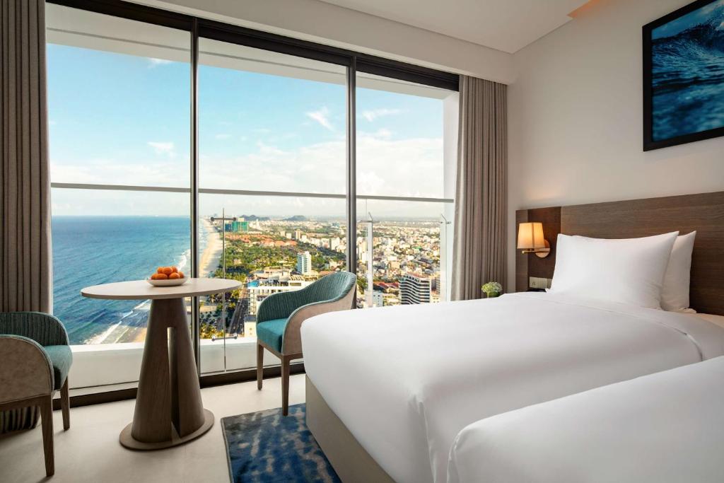Postel nebo postele na pokoji v ubytování Radisson Hotel Danang