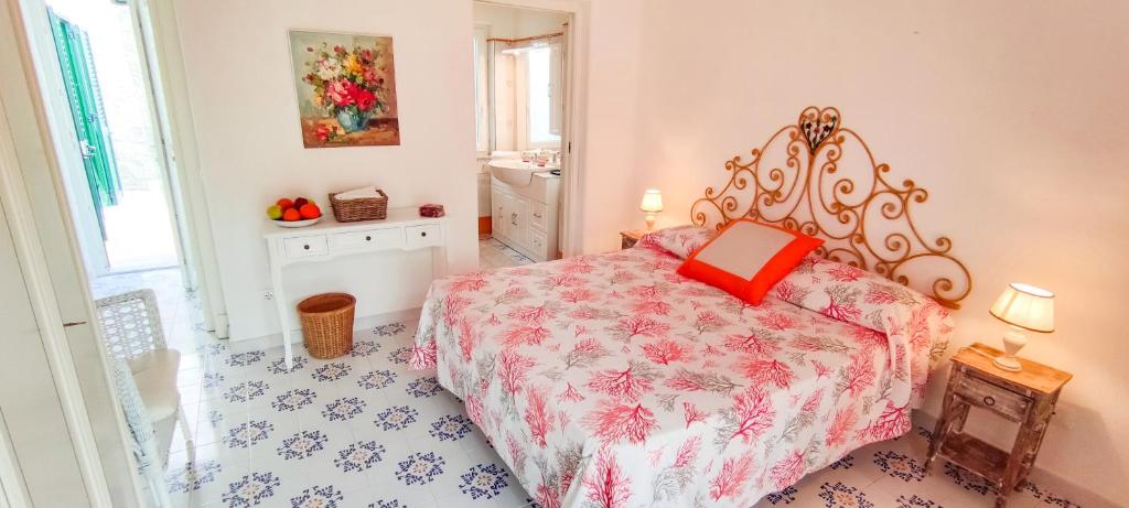 Postel nebo postele na pokoji v ubytování Villa Conchiglia blu con piscina