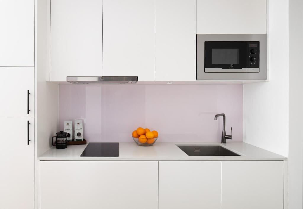 Kuchyň nebo kuchyňský kout v ubytování Citadines Flatiron Phnom Penh