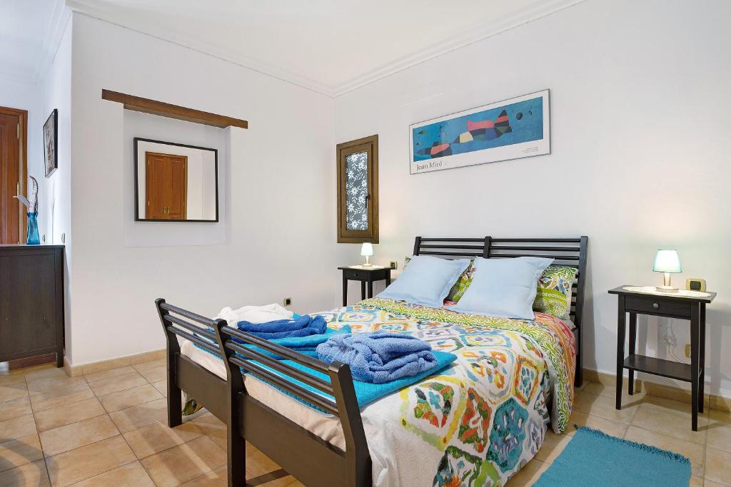 A bed or beds in a room at La Escuelita
