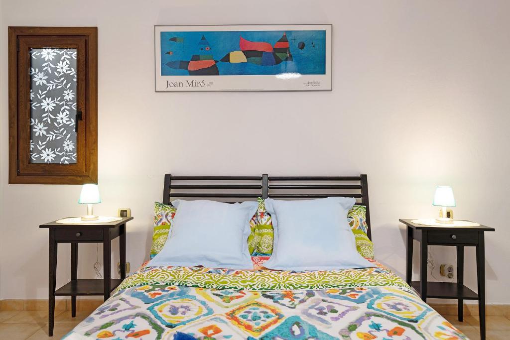 A bed or beds in a room at La Escuelita