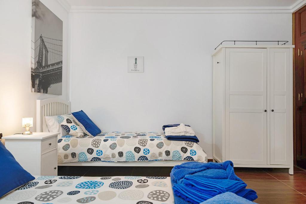 A bed or beds in a room at La Escuelita