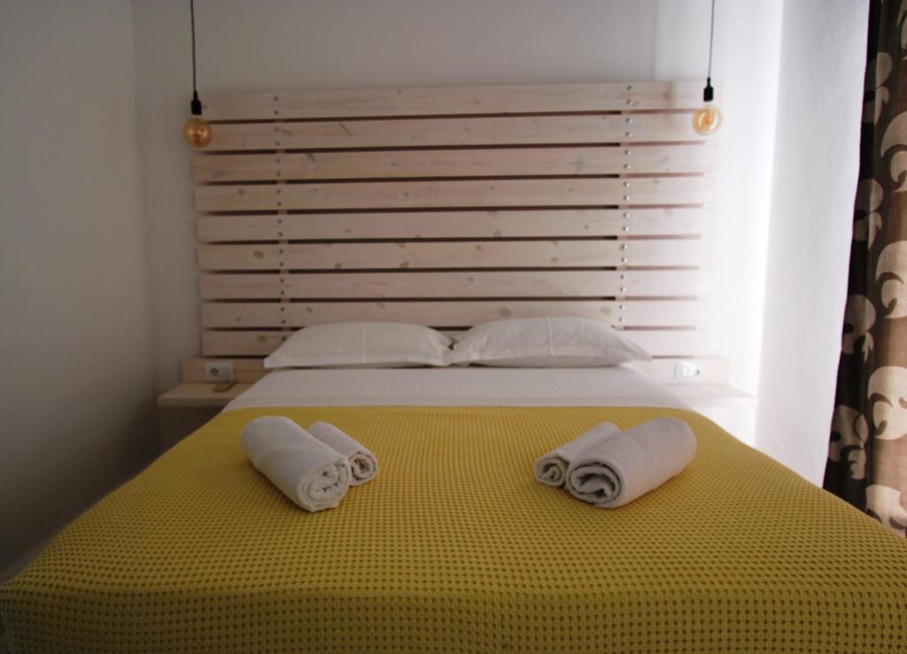 Postel nebo postele na pokoji v ubytování Saranda Hotel