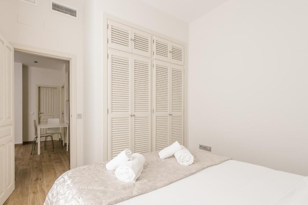 Postel nebo postele na pokoji v ubytování T1, Tirso de Molina, apartamento luminoso y tranquilo